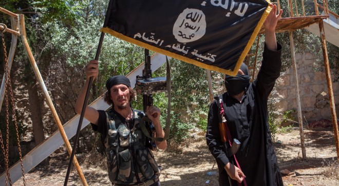 4 juli 2013: Rebellen van terreurorganisatie ISIS (Islamic State of Iraq and Syria), toen nog onderdeel van Al-Qaeda, ten noorden van Aleppo in gevecht met het regime van Assad. Foto: Hollandse Hoogte