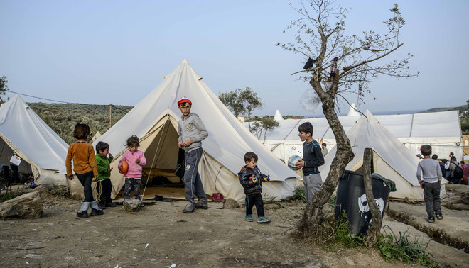 Syrische vluchtelingen in het Moria-kamp in Mytilini op het Griekse eiland Lesbos. Foto: Guillaume Pinon / Zuma Press / HH